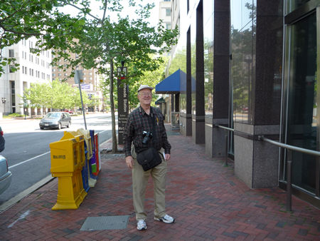 A tunnel under Wisconsin Avenue has an entrance in the building to the right.