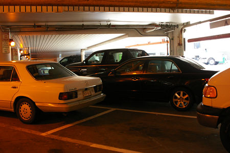 Zip cars are located within the terminal next to the buses.