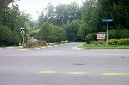Turn right at North Village Rd. and follow the path on the far side of that road.