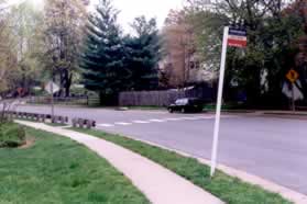 Upon reaching Wards Grove Cir turn left and follow the sidewalk for a short distance along that street.