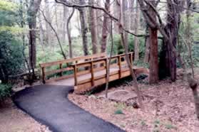 The trail turns right and crosses a bridge.