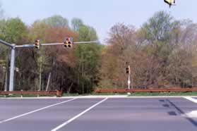 Cross Pioneer Ct and turn left to cross Roberts Pwy in the crosswalk.