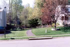 The trail crosses Vernons Oak Ct. Continue on the trail on the other side of that road.