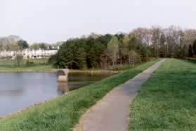 The trail crosses the dam.