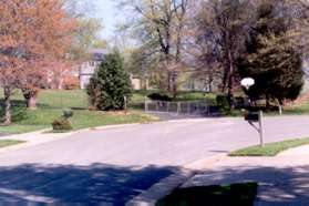 Turn right and follow the sidewalk to the end of Wicklow Dr.