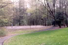 The trail turns right just prior to a basketball court.