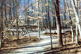 The path passes an entrance to the amphiatheater.