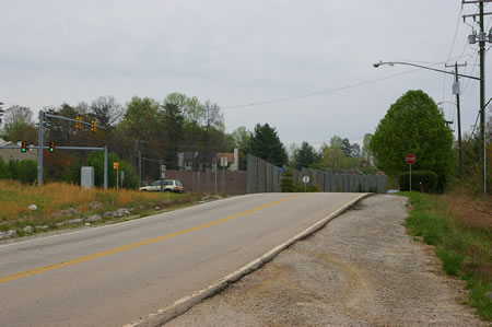 Walk on the shoulder of Hooes Rd. to Whitlers Creek Dr and turn left to cross the Fairfax County Parkway. This ends the walk on this section of the CCT.