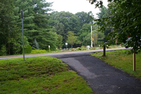 The trail surface changes to asphalt for the last few feet of the walk.