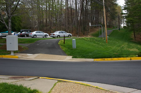 Cross Stream Way to access the asphalt trail along the telephone poles on the other side.