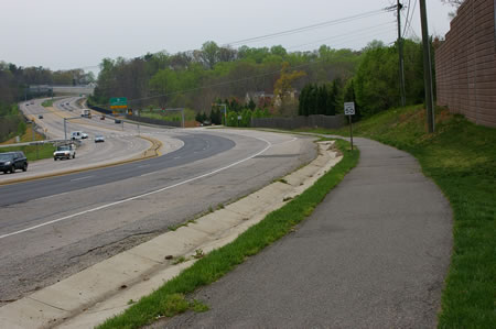 Turn right to follow the asphalt trail along the Fairfax County Parkway.