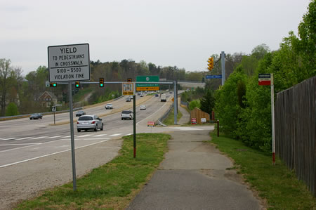 Take the trail to the first intersection (Whitlers Creek Dr). This marks the end of this section of the trail.