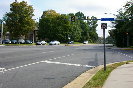 At the intersection with Trevor House Dr. cross that road, then turn left to cross Blake La. Then turn right to follow Blake La in an easterly direction.