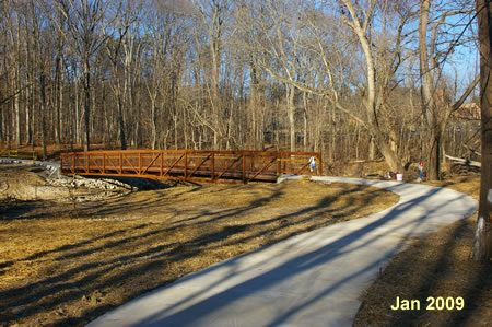 The trail crosses Accotink Creek on a bridge.