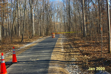 The start of this section of the trail goes down a hill away from Hunter Village Dr.