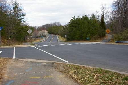 The walk ends at Glade Dr and Twin Branches Rd. The next section of trail is across Twin Branches Rd.