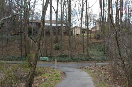 After crossing the bridge the trail turns left at the intersecting asphalt trail.