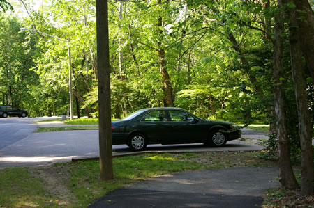 The trail passes 2 small parking areas.