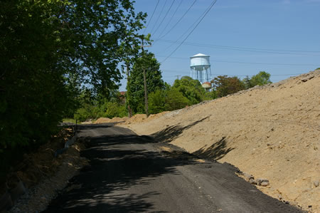 The trail passes a landfill on the right.