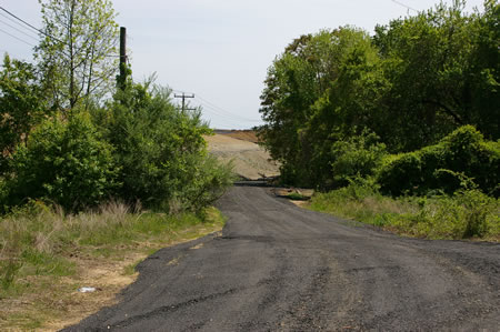 Turn left to follow a hard surface trail away from the perimeter road.