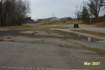 The trail joins an access road. Follow it to an intersecting prison road prior to the prison fence. Turn right to begin a detour route around the prison.