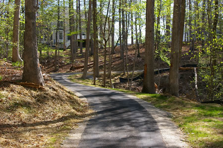 The trail makes a sharp turn as it approaches homes on Creekside View Lane.