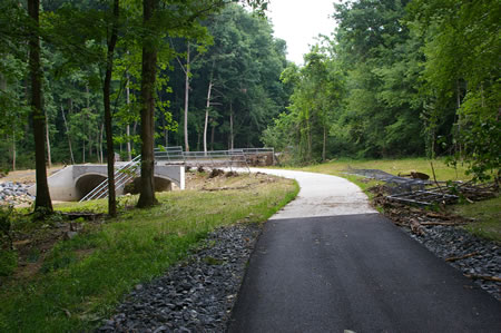 The trail crosses a bridge over the Accotink Creek.