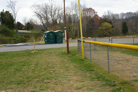 After crossing the outside of the ballfield fence turn right and then left to access the paved CCT trail under Rt. 236.