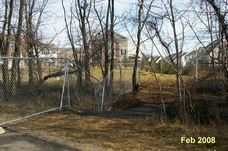 The fence blocks the prison road at the end. Turn right to follow a short detour around the fenced area. The tower ihas been declared unsafe.