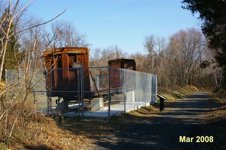 The trail passes an abandoned freight car that was found nearby.