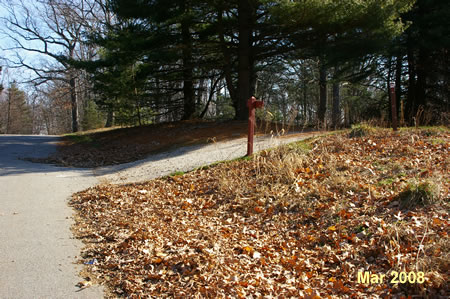 After climbing the hill on the restgricted road turn right at the first hard surface trail.