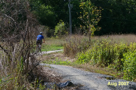 The trail turns right after passing over the ditch.