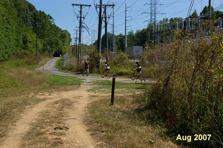 The alternate route joins the CCT from a trail on the right. Keep to the left to pass the power station on the right.