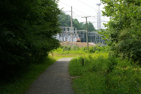 The trail approaches a power station.