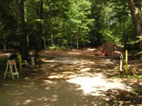 The walk starts at a dirt service road next to the play area.