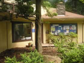 The trail passes the front of the Nature Center.