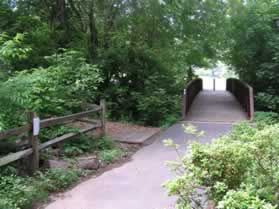 After passing the Nature Center continue straight and cross the bridge.