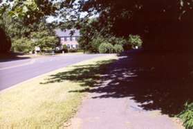 The trail intersects with Bennington Woods Rd.  Turn right onto the wide asphalt trail.