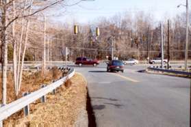 Turn left and follow Carpers Farm Way to cross Rt. 7 at the traffic light.