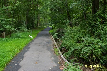 This portion of the path collapsed because of erosion from the stream.