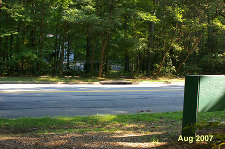 The trail intersects with Glade Dr. in front of the Nature Center.  Cross the street and take the asphalt trail to the right.