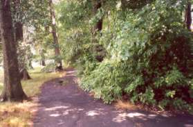 The path enters along the golf course area.