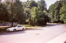 Cross Upper Lakes Drive and take the sidewalk to the right along the tennis courts.