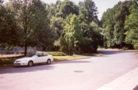 Cross Upper Lakes Drive and take the sidewalk to the right along the tennis courts.