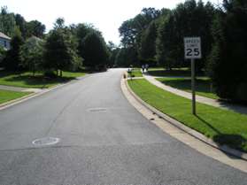 Follow the sidewalk along Longwood Grove Dr.