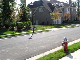 Cross the street and turn right along the sidewalk on the other side.