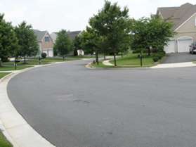 Turn left after passing through the houses and follow the sidewalk on the right along Crippen Vale Ct.