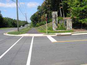 Turn right at the intersection with Baron Cameron Ave. and follow the asphalt trail along that road.