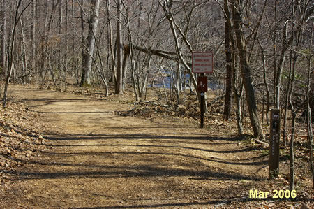 The trail connects to a wide trail for use by park service vehicles.