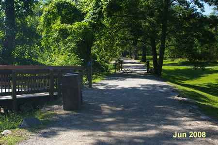 The trail passes an entrance to a n overlook of the falls.